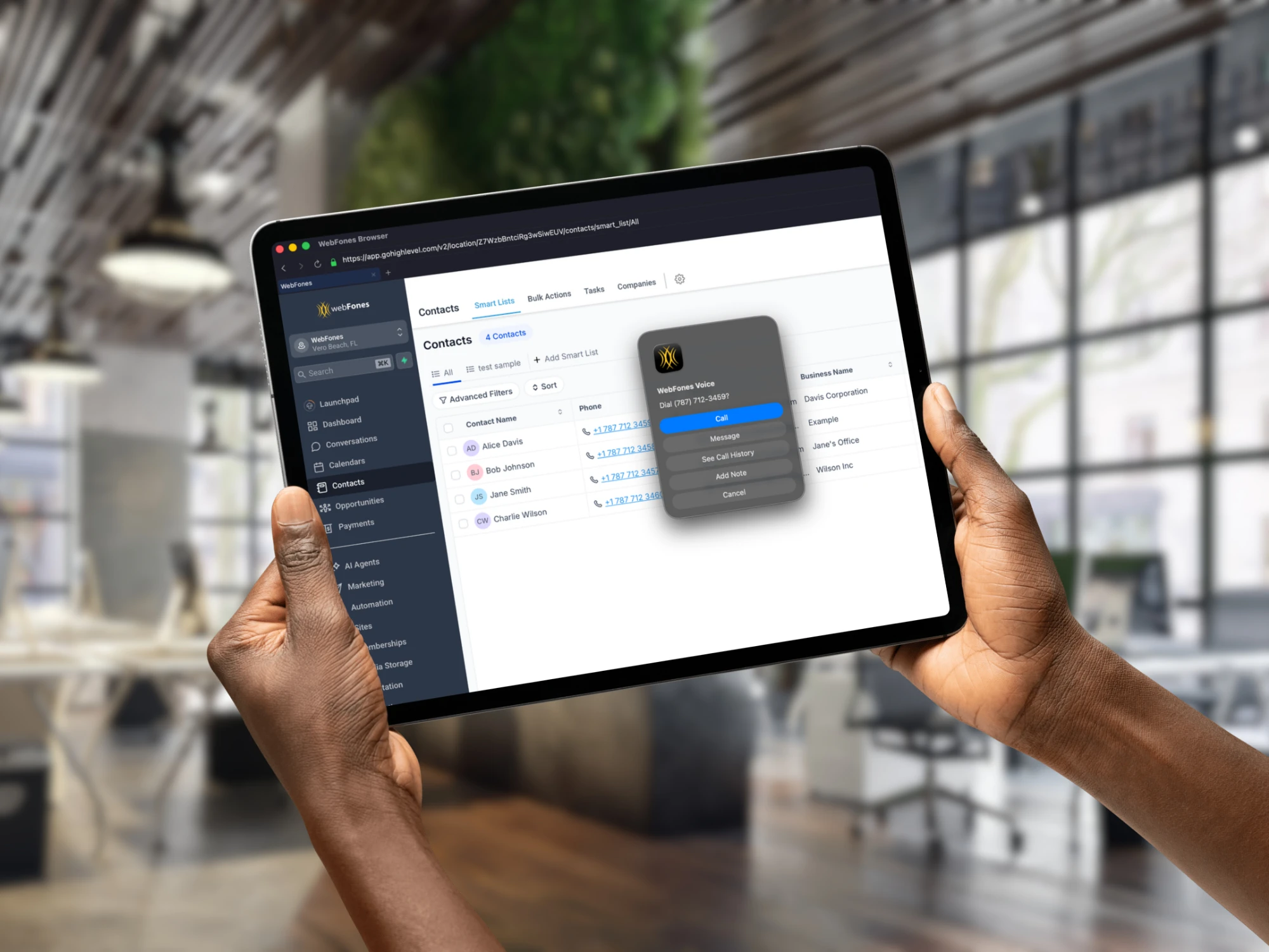 WebFones Browser turning a CRM contact's phone number into a click-to-call action on a tablet